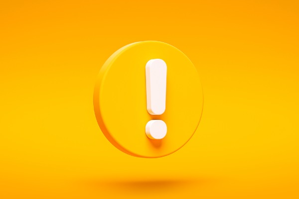 yellow exclamation mark symbol to signify caution or alert